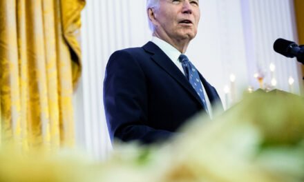 Biden Signs Spending Bill, Finalizing End to Shutdown Drama