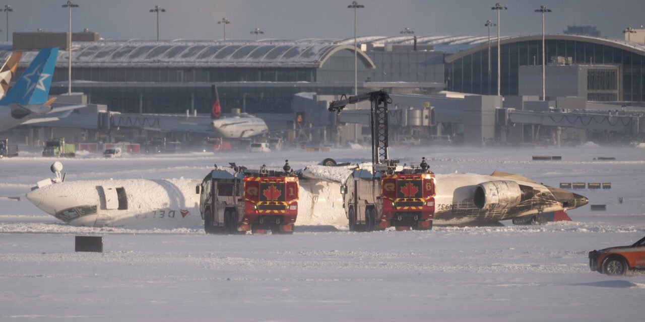 Plane Flips Over in Toronto, and Migrants Trapped in Panama Hotel