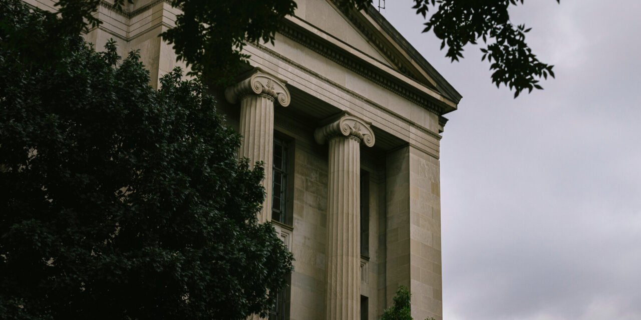 Justice Dept. Officials File Suit, Saying They Were Dismissed Unlawfully