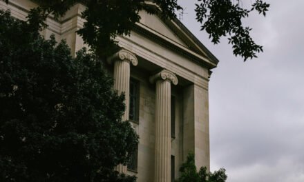 Justice Dept. Officials File Suit, Saying They Were Dismissed Unlawfully