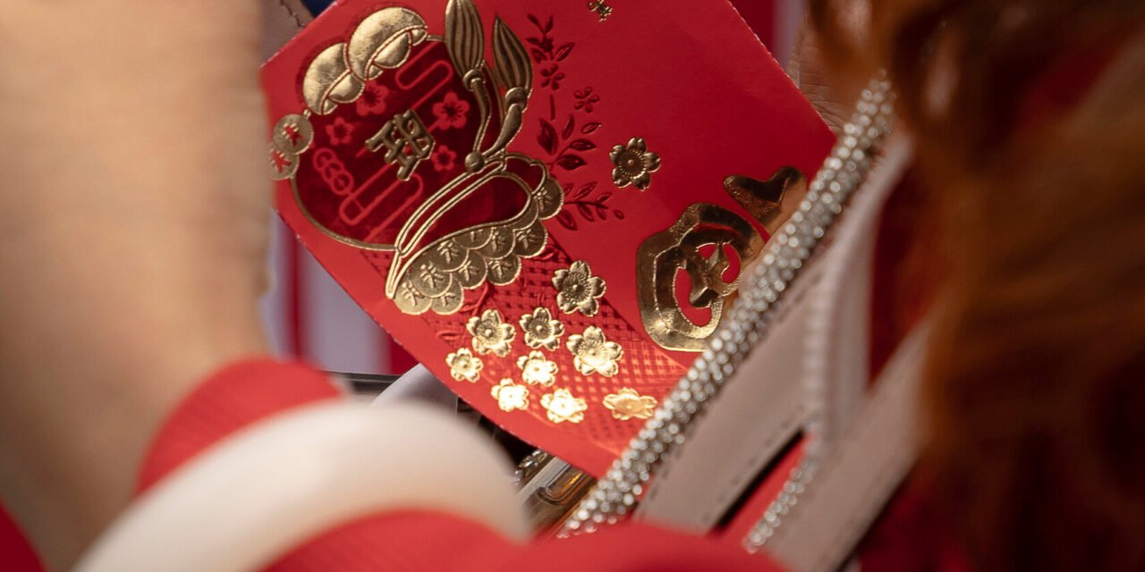 Red Envelopes With Cash Are Changing Hands at Adams Campaign Rallies