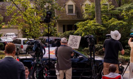 Search of Bolton’s Home Shows Uneasy Mix of Retribution and Law Enforcement