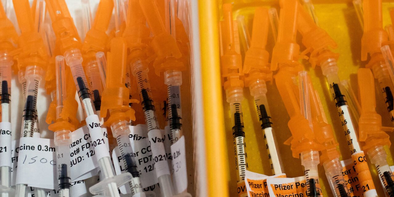 F.D.A. Official Overruled Scientists on Wide Access to Covid Shots